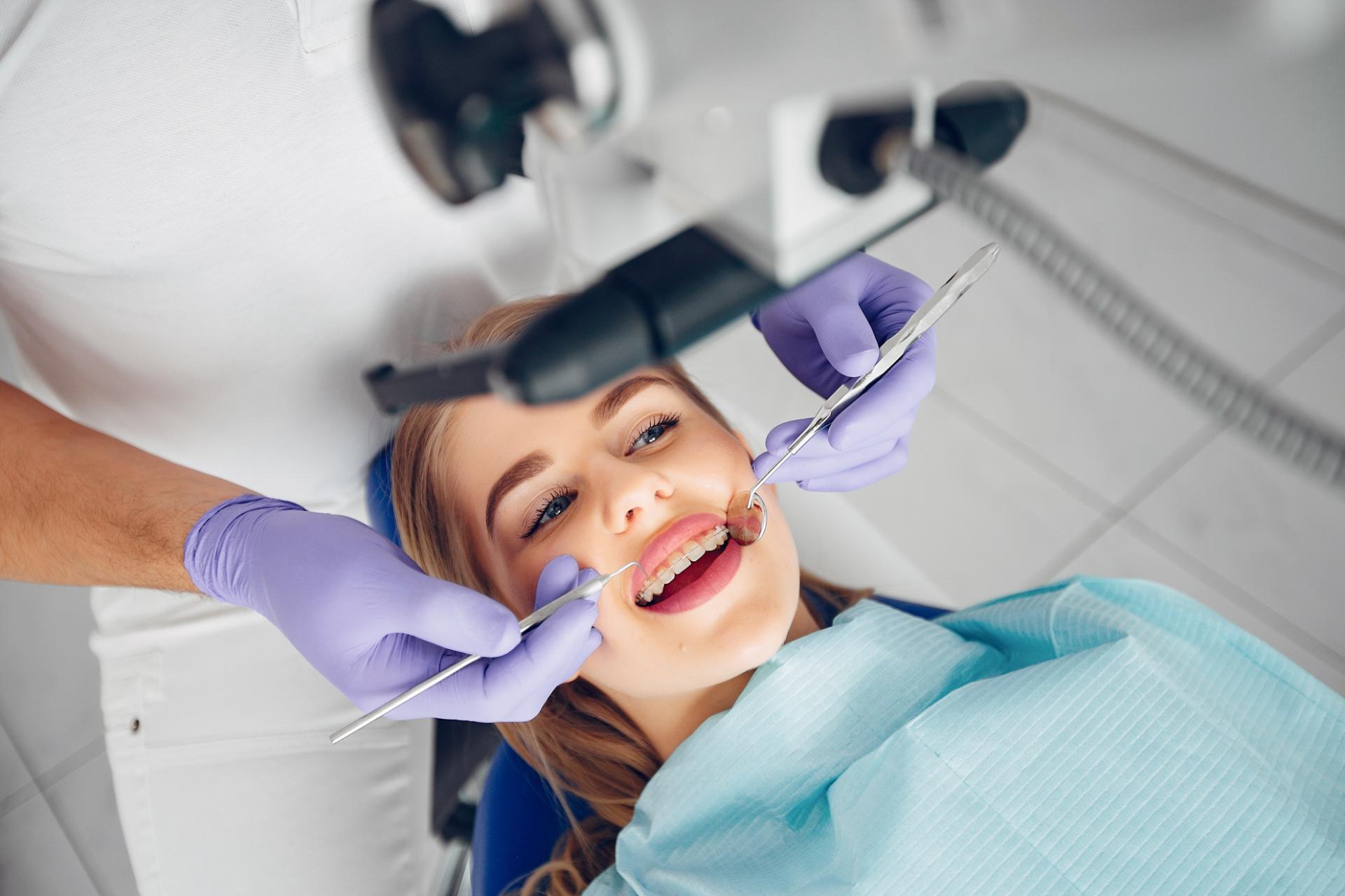 beautiful girl sitting dentist s office