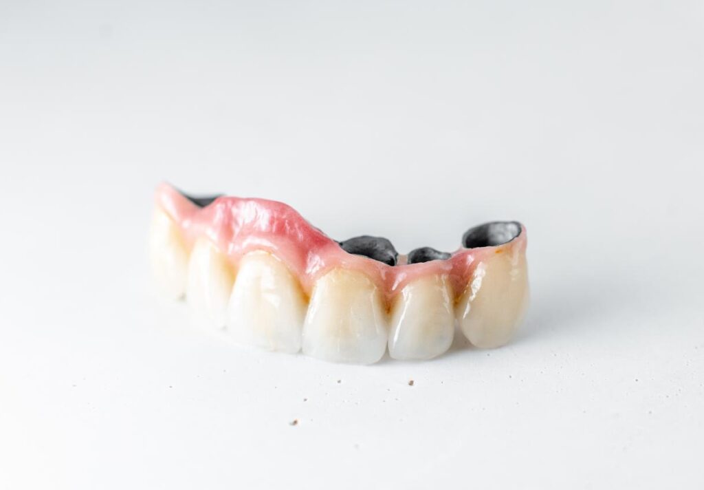 dental crowns on the white background e1694600536837